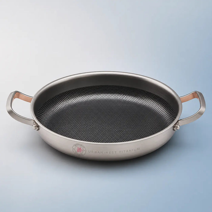 Urban Nest uncoated titanium stainless steel frying pan, studio front view